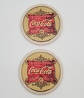 2 Coca Cola Coasters 4in Ceramic Cork Backed Drink Ad Design Vintage 2000