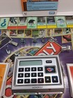 Hasbro Monopoly Here   Now  The World Edition Family Game Electronic Banking 