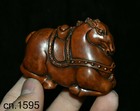 Lucky Chinese Boxwood Wood Hand Carved Wealth Yuanbao Lying Tang Horse Statue