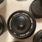 Camera Lens Lot Including Vivitar 28mm 1 2 8 Mc Wide Angle 49mm Lens Used