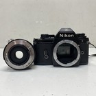 Nikon Em 35mm Slr Camera With Vivitar 28mm 1 2 8 Lens With Case