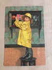 Antique National Biscuit Company Lithograph Advertisement Raincoat Boy Cupboard