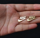 Set Of Gold Plated Stainless Steel Swoosh Earrings     Butterfly Back