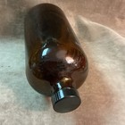 Vintage Amber Glass Bottle With Black Hard Plastic Stopper Marked Pg
