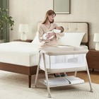 Delta Children Haven Airflow Bassinet With Breathable Mesh And Wheels  Tan