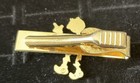 Vintage Reddy Kilowatt Tie Clip