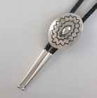 Southwestern Radiant Stamped Sterling Silver Repousse Center Bolo Tie