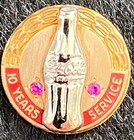 Coca-cola Service Pin - 10 Year Gold  Silver Bottle  W red Inlay And 2 Rubies 