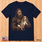 Bigfoot Holding A Basset Hound Graphic For Dog Lovers T-shirt
