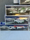 Lot Of 13 Hess Trucks In Box