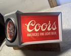 A Vintage Coors Lighted Three-sided Bar Top Or Cash Register Sign
