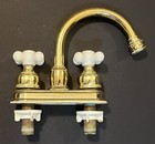 Delta Brass shiny Gold Center Set Faucet Bathroom Sink W  White Porcelain Knobs