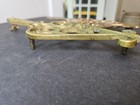 2 vtg Brass Footed Metal Trivet Flat Iron Open Work Design Hanging Trivet -7 5 