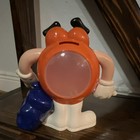 M m s Orange Character Advertising Figure Candy Holder Container W  Blue Bag