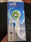 Oral-b Pro 1000 Rechargeable Electric Toothbrush  White  damaged Box 