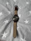 Limit Brand Timepiece  Black Dial With Yellow Numerals And A Brown Leather Strap