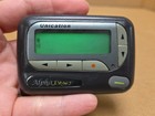 Unication Alpha Elegant Numeric Pager Beeper W  Holder  Powers On  see Pics 