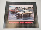 1984 Pontiac 2000 Sunbird Showroom Dealer Advertisement 17x20 Cardboard