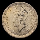          1942 British India  500 Silver 1 4 Rupee Coin  Crowned Head  Floral Wreath