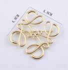Anagram Brooch Gold Metal
