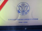 United States Liberty Coins 1886-1986   2 Coin Set   90  Silver Dollar   Half  