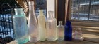 Lot Of 7 Antique Small Embossed   Unembossed Bottles