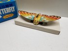New _ Vintage Juyou   Retro Butterfly 8    Wide Wind-up Tin Litho Toy Turns Over