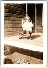 1920 Adorable Toddler Boy Rocking Chair Porch Dog Puppy Pet Buster Vintage Photo