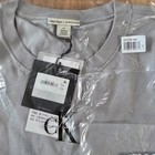 Jungkook  X Calvin Klein Limited Unisex Logo Badge T-shirt    L  