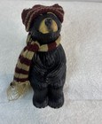 Black Bear Sitting Figurine Adorned With A Knitted Hat   Scarf Home Decor Piece
