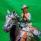 Cowboy On Horseback With Rifle Resin Sculpture 8  Wide X 9 5  Tall