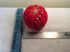 Large Sewing Pin Cushion With Some Pins