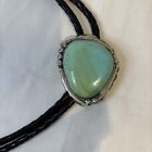 Eric   Carol Fierro Navajo Sterling Silver   Turquoise Bolo Tie Braided Leather