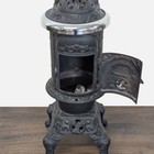 Antique Iron Parlor Stove With Silver Accents