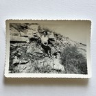 Vintage B w Snapshot Photograph Beautiful Young Woman Sitting On Rocks