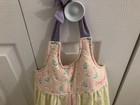Oshkosh Baby Flowered Yellow   Pink Ruffled Diaper Stacker