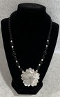 Lee Sands Carved Hibiscus Mother Of Pearl Necklace Black   White Glass Beads