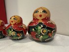 Vintage Russian Matryoshka Nesting Dolls  7 Piece Red black  gold Floral Painted