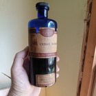 1920s Dodge   Olcott Oil Cedar Wood Cobalt Labeled Bottle W stopper   Contents