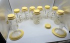 Medela Breast Milk Storage Bottles With Yellow Lids - 9 Bottles 5oz   Wipes Pack