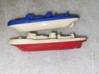 Two Vintage Hard Plastic Ship Shaped Whistles 4  Long