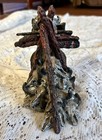 Handcrafted Tribal Style Animal Figurine With Feather And Wood Details