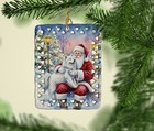 Caroline s Treasures Samoyed With Santa Claus Porcelain Ornament Fnt1075co2
