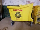 Rubbermaid Commercial Wavebrake 35 Qt Side Press Mop Bucket Wringer Yellow - Use