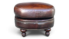 Vintage Oval Brown Leather Ottoman With Brass Nailhead Trim   Carved Wood Feet