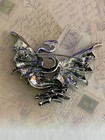 Majestic Silver Dragon Brooch With Intricate Wings And Fierce Details
