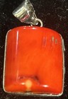 Pendant Of Carnelian Stone With Black Iron   Peach Color Band On Back 