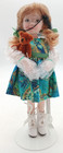 Brenda Mize   Stella Porcelain Doll   1 1   With Teddy Bear   Green Dress