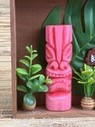Tiki Art Pink Resin Tiki With Don The Beachcomber Sign And Lots Of Plants