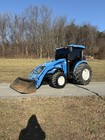 2009 New Holland T2420 Tractor With Loader And Enclosed Cab